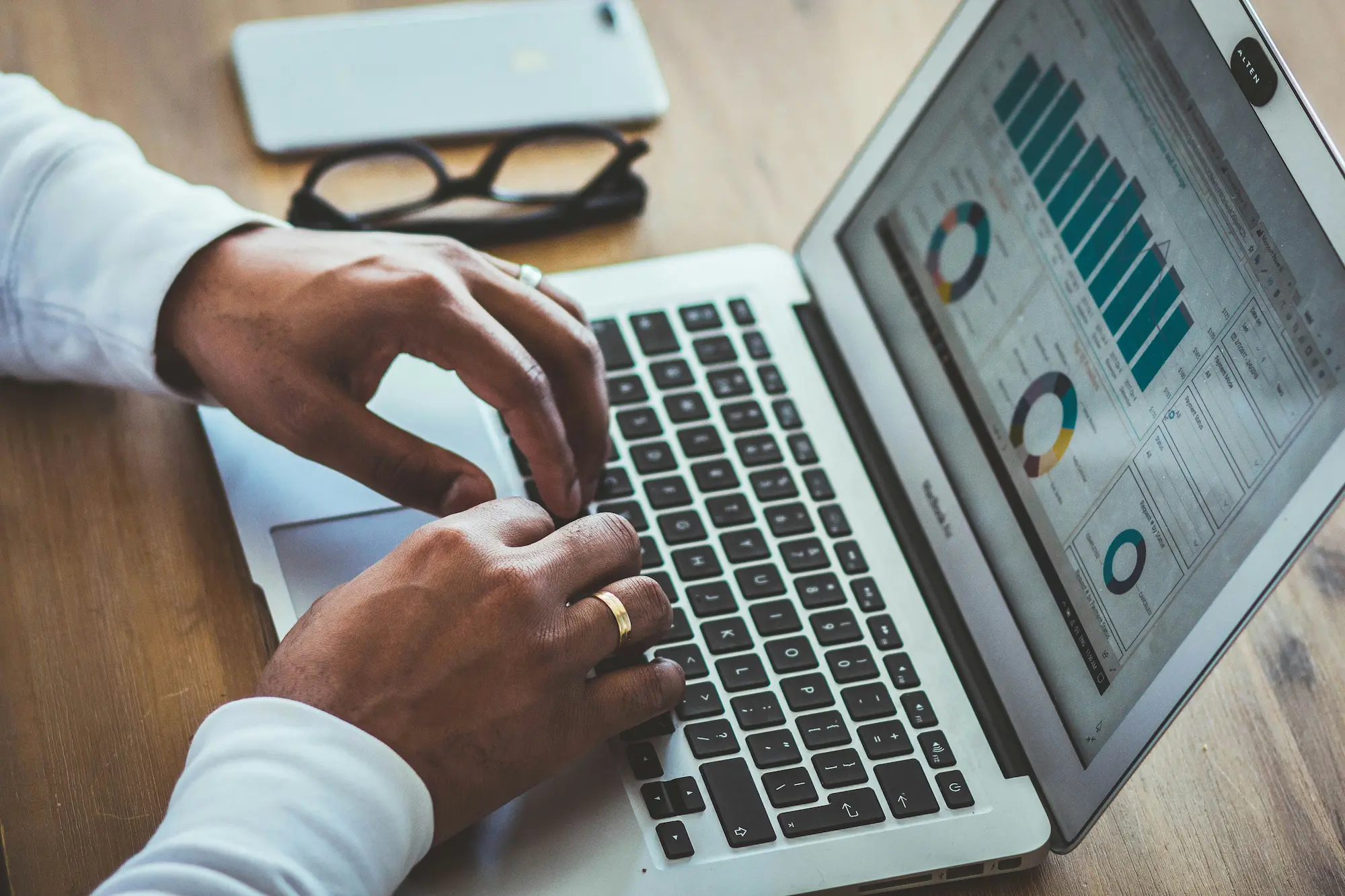 Mining ERP supporting data-driven decisions with charts on screen, image by Novacura