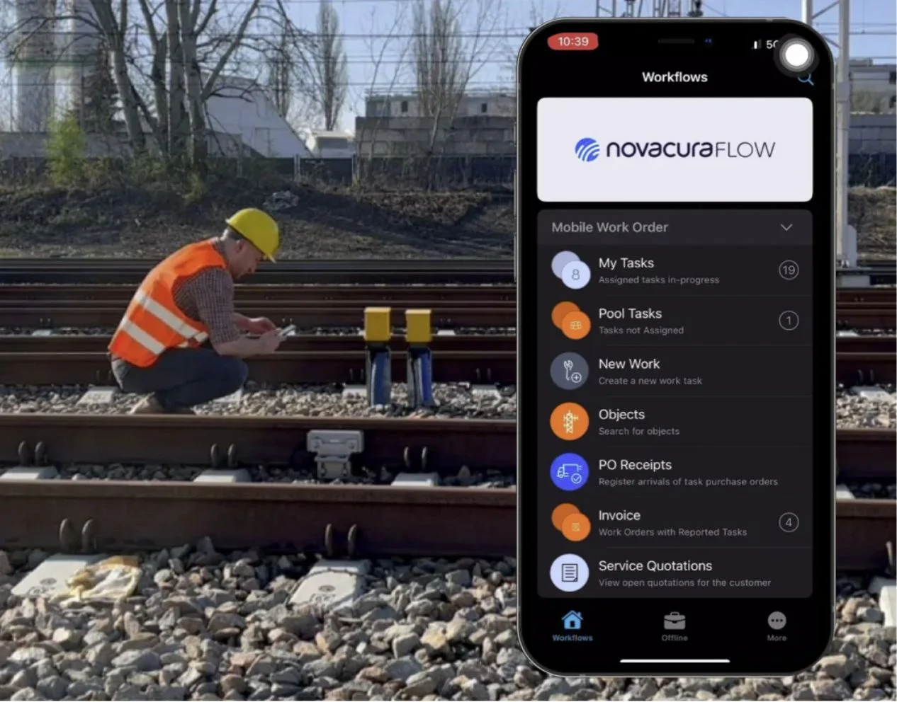 Technician on railway using FSM mobile work order app, image by Novacura